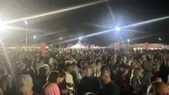BBC Thousands of people stood outside the Alexander Stadium