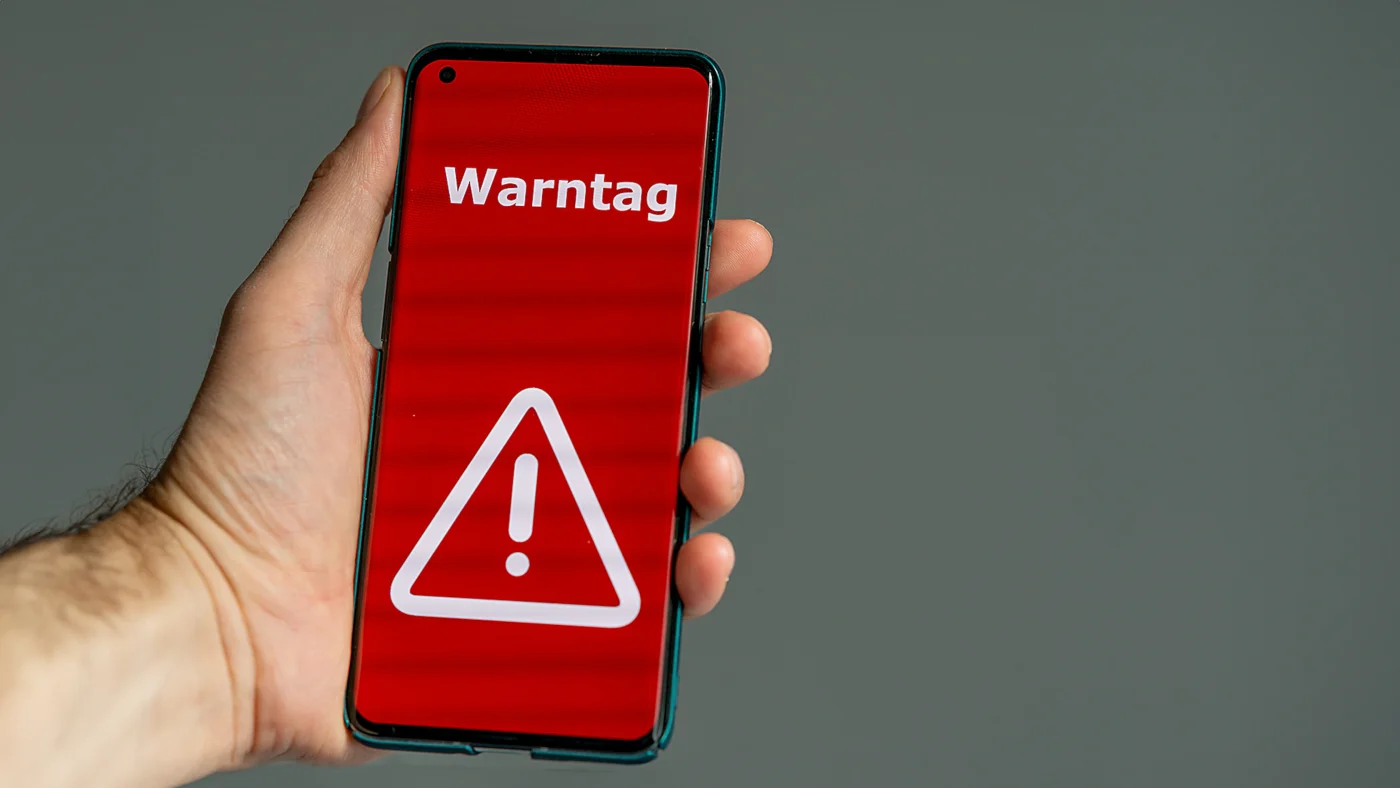 Handy mit Warnmeldung