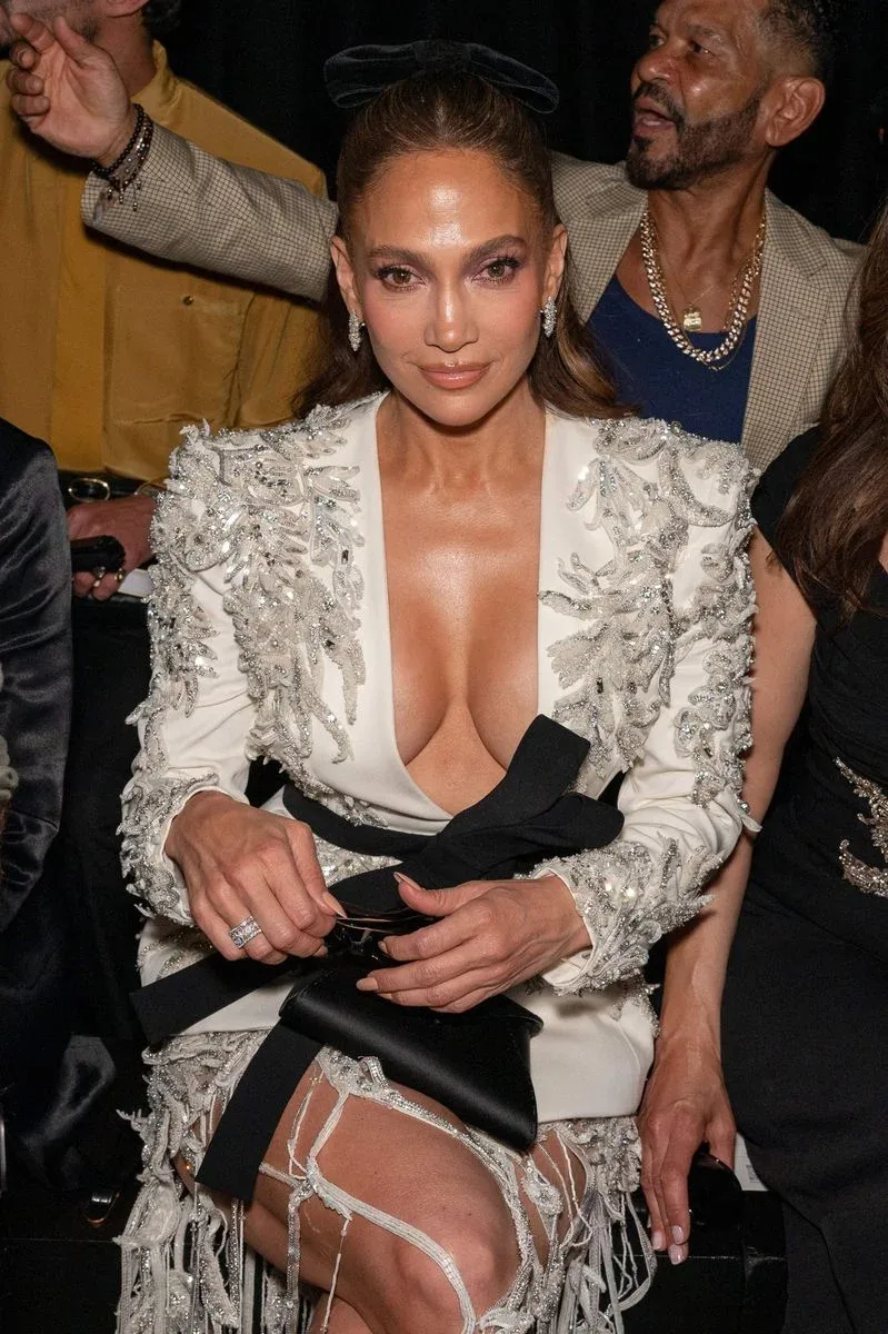 Jennifer Lopez wearing a black and white embroidered outfit as she makes her way to the Zuhair Murad Haute Couture Fall/Winter 2026-2027 fashion show.