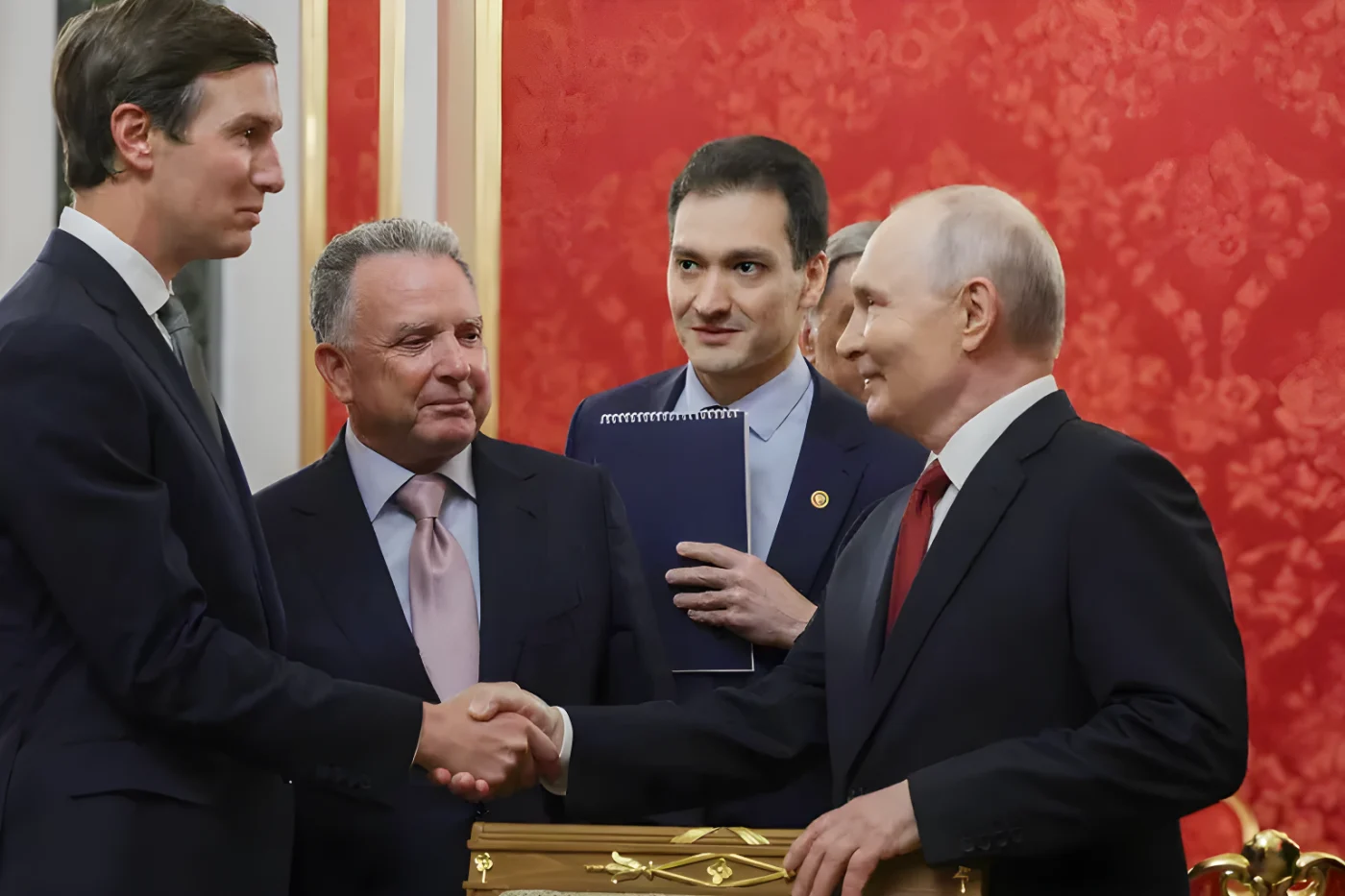 In this pool photograph distributed by the Russian state agency Sputnik, Russia
